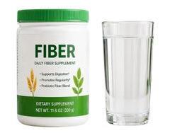 fiber supplement container next to a glass of water for proper fiber intake